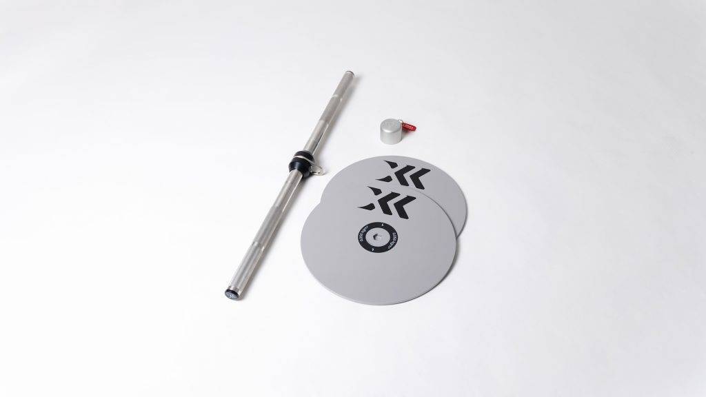 A collection of accessories including a knurled kBar, 2 large flywheels and an advanced flywheel knob