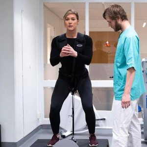 harness squat with limited range of motion in a medical setting