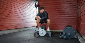 Squat on a kBox in a garage gym