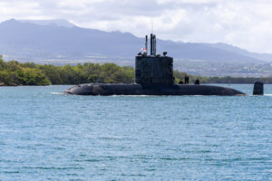 Royal Canadian Navy submarine HMCS Corner Brook departing Pearl Harbor during RIMPAC 2026